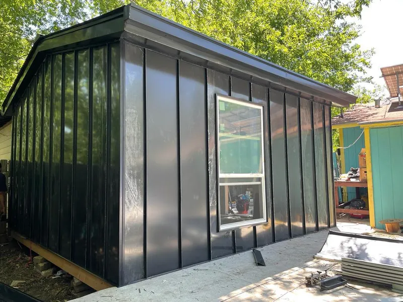 Black standing seam metal wall panels for Roof Inspection in Indian River Estates