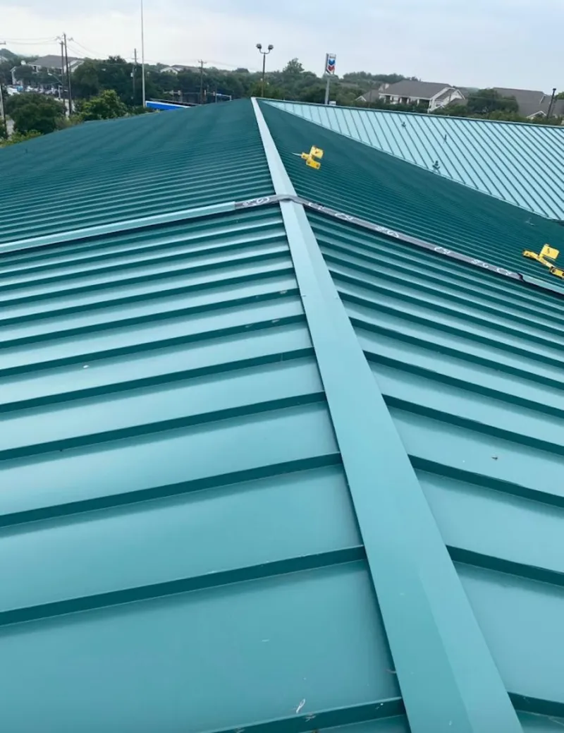 Green commercial metal roof ridge and valley for Metal Roof Repair in Indian River Estates